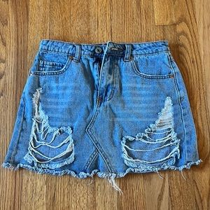Signature denim short skirt. Small. Rips on front!